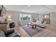Bright living room featuring a large window, natural light, and modern decor at 30 Mary Ella Dr, Carrollton, GA 30116