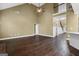 Spacious living room with high ceilings, hardwood floors, and natural light at 108 Donovan Ave, Locust Grove, GA 30248