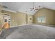 Expansive bedroom with vaulted ceiling, carpet flooring, and lots of natural light at 108 Donovan Ave, Locust Grove, GA 30248