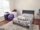 Cozy bedroom with a comfortable bed, natural light, and a work space, ideal for relaxation and productivity at 3332 Glenrose Trl, Chamblee, GA 30341
