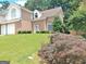 Charming two-story brick home with manicured lawn and mature trees at 3332 Glenrose Trl, Chamblee, GA 30341
