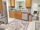 Functional kitchen design with stainless steel appliances and granite countertops at 3332 Glenrose Trl, Chamblee, GA 30341