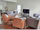 The living room features hardwood floors and large windows at 3332 Glenrose Trl, Chamblee, GA 30341