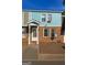 Charming townhome featuring a brick facade, blue siding, and a welcoming front entrance at 796 Glynn Oaks Dr, Clarkston, GA 30021