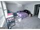 Spacious bedroom with soft carpet and gray walls illuminated by natural light at 796 Glynn Oaks Dr, Clarkston, GA 30021