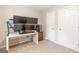 Office features a multi-monitor workstation and a white desk at 2600 Neighborhood Walk, Villa Rica, GA 30180