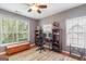 Well-lit office space with hardwood floors and dual windows, creating a functional and inviting work area at 2600 Neighborhood Walk, Villa Rica, GA 30180