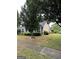 Charming single-story home with well-manicured lawn and mature trees at 300 Monarch Village Way, Stockbridge, GA 30281