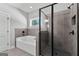Modern bathroom featuring a soaking tub and a tiled glass-enclosed shower with contemporary fixtures at 296 Deer Creek Run # 11, Moreland, GA 30259