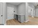 Cozy home office nook with a built in desk, cabinet and wood-look floors at 296 Deer Creek Run # 11, Moreland, GA 30259