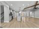 Open floor plan featuring kitchen with a gray island and stainless steel appliances at 296 Deer Creek Run # 11, Moreland, GA 30259