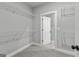 Spacious walk-in closet with carpeted floors and metal shelving for optimal organization at 296 Deer Creek Run # 11, Moreland, GA 30259