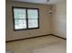 Bright bedroom with large windows offering natural light, neutral paint, and carpet at 404 Windsor Way, Peachtree City, GA 30269