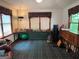 Bright bedroom with traditional carpet, green cabinet and large windows at 404 Windsor Way, Peachtree City, GA 30269