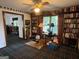Inviting living room with built-in bookshelves and ample natural light at 404 Windsor Way, Peachtree City, GA 30269