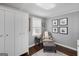 Cozy bedroom with closet, chair and accent pictures at 1981 Shalimar Ne Dr, Atlanta, GA 30345