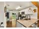 Inviting kitchen with stainless appliances, white cabinets, and a view to the outdoor space at 1981 Shalimar Ne Dr, Atlanta, GA 30345