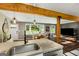 Open-concept kitchen featuring modern appliances and a breakfast bar with views to the living room and front yard at 1981 Shalimar Ne Dr, Atlanta, GA 30345