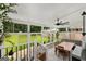 Bright sunroom featuring large windows, built-in seating, and backyard views at 1981 Shalimar Ne Dr, Atlanta, GA 30345