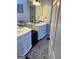 Well-lit bathroom with double vanity and modern fixtures at 3955 Sweetwater Pkwy, Ellenwood, GA 30294