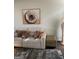 Comfortable living room with neutral-toned furniture, decorative rug, and stylish lamp at 3955 Sweetwater Pkwy, Ellenwood, GA 30294