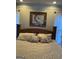 Cozy bedroom with a comfortable bed, soft pillows, and a window view at 3955 Sweetwater Pkwy, Ellenwood, GA 30294