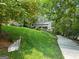 Charming home with a well-manicured lawn and a long driveway leading to the property at 610 Lake Dr, Snellville, GA 30039