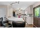 Bright kitchen with stainless steel appliances and bar seating at 610 Lake Dr, Snellville, GA 30039