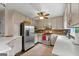 Well-lit kitchen featuring stainless steel appliances and countertop space at 610 Lake Dr, Snellville, GA 30039