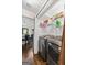 Convenient laundry area adjacent to the kitchen, featuring modern washer and dryer at 610 Lake Dr, Snellville, GA 30039