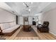 Inviting living room features wood-look flooring, neutral paint, and recessed lights at 610 Lake Dr, Snellville, GA 30039