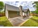 Backyard patio features outdoor seating, ideal for enjoying the serene surroundings and outdoor dining at 345 Morning Star Dr, Temple, GA 30179