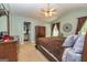 Cozy main bedroom with fan, bathroom access, closet, and comfortable ambiance at 345 Morning Star Dr, Temple, GA 30179
