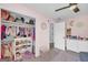 Bedroom closet offers ample storage with a variety of shelving and hanging space for an organized wardrobe at 557 Spring Creek Ne Way, Marietta, GA 30068