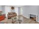 Bright living room with hardwood floors, comfortable seating, and integrated pet nook at 557 Spring Creek Ne Way, Marietta, GA 30068