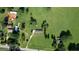 Overhead shot displaying the home's setting amidst trees and expansive grounds at 12621 Highway 142, Oxford, GA 30054