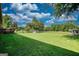 Lush backyard with plenty of room, featuring a shed and potential for outdoor activities and landscaping at 12621 Highway 142, Oxford, GA 30054