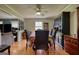 Traditional dining room with an elegant dining table and chairs, plus beautiful decorative hutch at 12621 Highway 142, Oxford, GA 30054