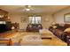 Well appointed living room featuring a beautiful fireplace and a decorative carpet at 12621 Highway 142, Oxford, GA 30054