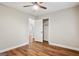 Bedroom featuring hardwood floors, a ceiling fan, and a spacious closet for storage at 2858 Valley Ridge Dr, Decatur, GA 30032