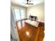 Bonus room has hardwood floors, ceiling fan and double doors leading to a patio at 2858 Valley Ridge Dr, Decatur, GA 30032