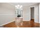 Open concept dining area with hardwood floors, stylish lighting, and seamless flow to living spaces at 2858 Valley Ridge Dr, Decatur, GA 30032