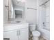 Bathroom with white vanity, framed mirror, and combined tub/shower at 3005 Nicholas Dr, Villa Rica, GA 30180