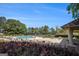 Resort-style pool with lounge chairs and lush landscaping in a beautiful community setting at 3005 Nicholas Dr, Villa Rica, GA 30180