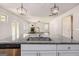 Granite countertops and stainless steel appliances overlooking spacious living room at 3005 Nicholas Dr, Villa Rica, GA 30180