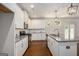 Bright kitchen featuring white cabinets, stainless steel appliances, and granite countertops at 3005 Nicholas Dr, Villa Rica, GA 30180