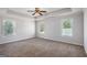 Spacious main bedroom with tray ceiling and large windows at 3005 Nicholas Dr, Villa Rica, GA 30180