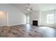 The living room features sleek hardwood floors and a cozy fireplace at 267 Eason St, Bowdon, GA 30108