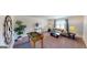 Comfortable living room with gray sofa, foosball table and decorative wall art at 263 Eason St, Bowdon, GA 30108