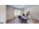 Comfortable office space with a work desk, stylish seating, and a bright window offering natural light at 263 Eason St, Bowdon, GA 30108